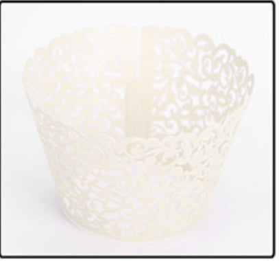 Cupcakes With Paper Cutouts Around The Edge Of The Cake Cups