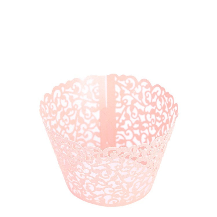 Cupcakes With Paper Cutouts Around The Edge Of The Cake Cups