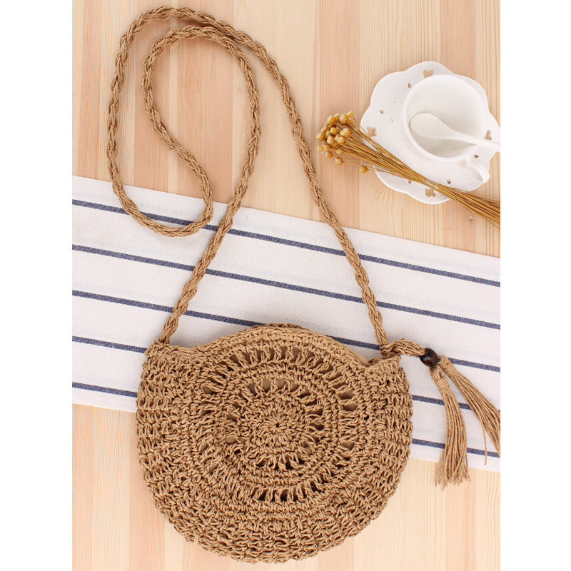 Straw bow crossbody woven bag