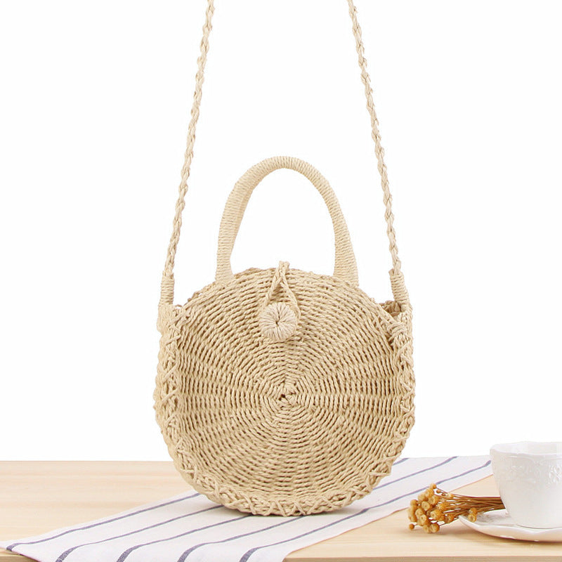 Straw bow crossbody woven bag
