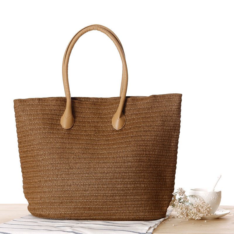 Straw bow crossbody woven bag