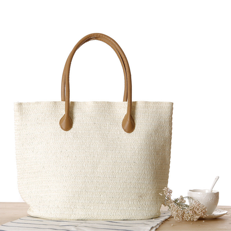 Straw bow crossbody woven bag