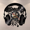 Earphone style vinyl record wall clock