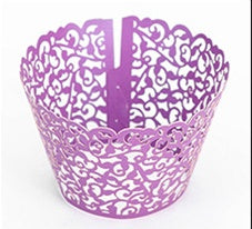 Cupcakes With Paper Cutouts Around The Edge Of The Cake Cups
