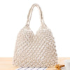 Straw bow crossbody woven bag