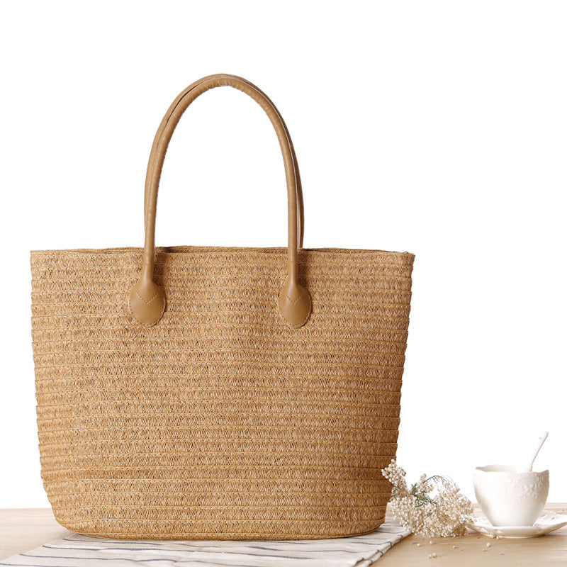 Straw bow crossbody woven bag